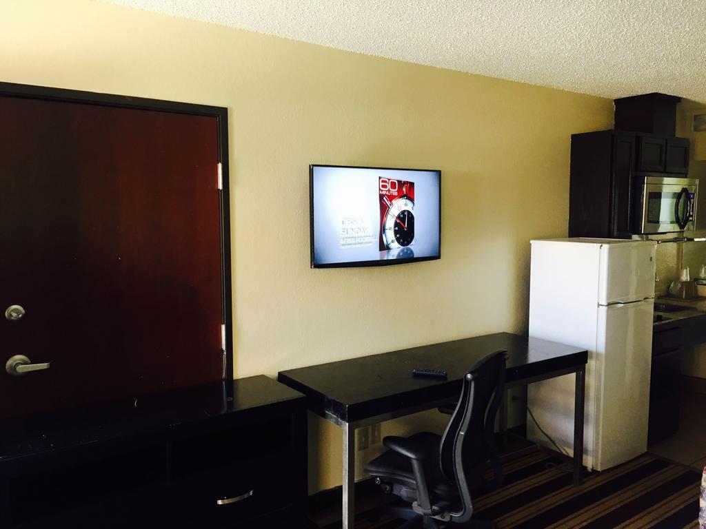 Executive Inn Groves Habitación foto